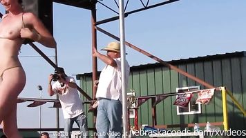 interesting amateur pole stripping contest at a iowa biker rally