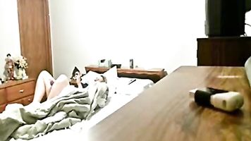 Hidden cam caught my mum on bed masturbating