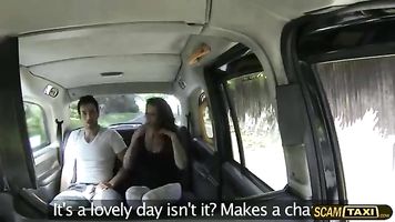 Horny lovers is having fun in the backseat of the taxi