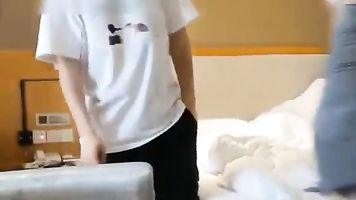 Chinese college girl is sucking a dick in a hotel